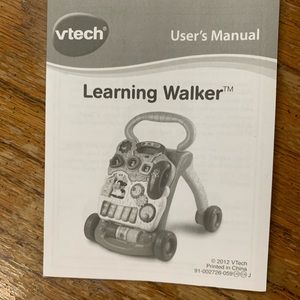 V-Tech sit to stand baby walker